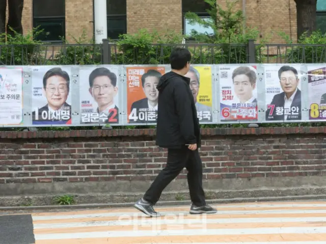 公車站出現「不要選擇候選人 OO」的塗鴉和印刷資訊...要求調查 = 韓國濟州島