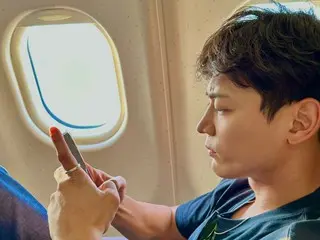 “SHINee”珉豪在飛機上一臉嚴肅……“我沒有生氣……泰民攝。”