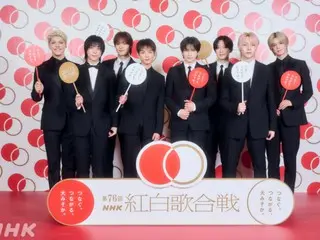 &TEAM 成員們穿著西裝，顯得莊重而威嚴…「登上紅白歌合戰的舞台是我們的目標和夢想之一」。